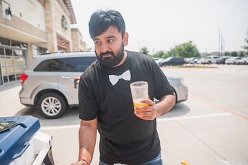 Man with shirt that has bowtie printed on it