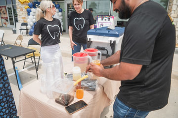 Close up of man making fruit drinks