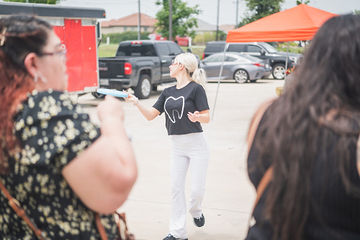 Woman looking over shoulder while walking through parking lot