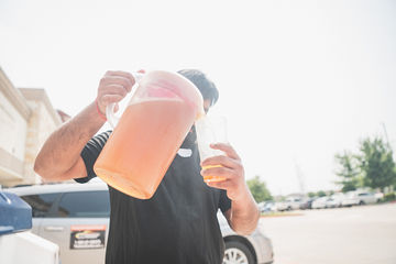Pouring some tea into a cup