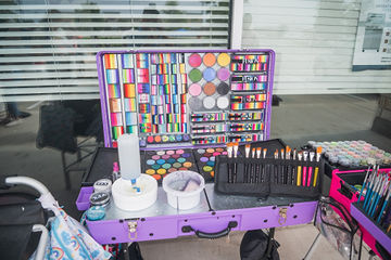 Paintbrushes and paints used for face painting