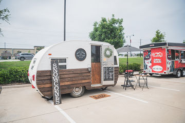 Far shot of trailer where snow cones are served