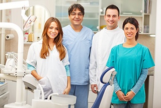 Dental team members smiling