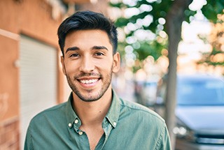 A young male happy with his healthy smile