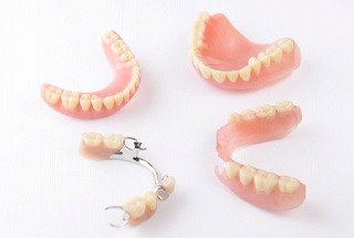 Different types of dentures with white background