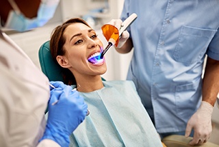 A woman getting tooth-colored fillings in McKinney