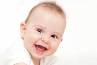 Infant smiling before visiting children's dentist in McKinney