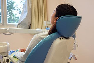 Relaxed woman in dental chair