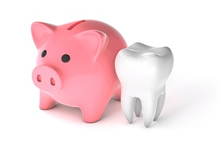 tooth and piggy bank illustration for cost of veneers in McKinney