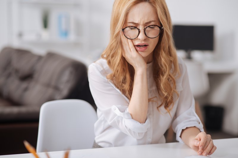 Woman with a dental implant failure