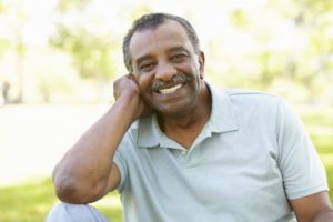 man smiling with dental implants in McKinney